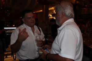 El Gran Inka Grand Opening people talking and having drinks.