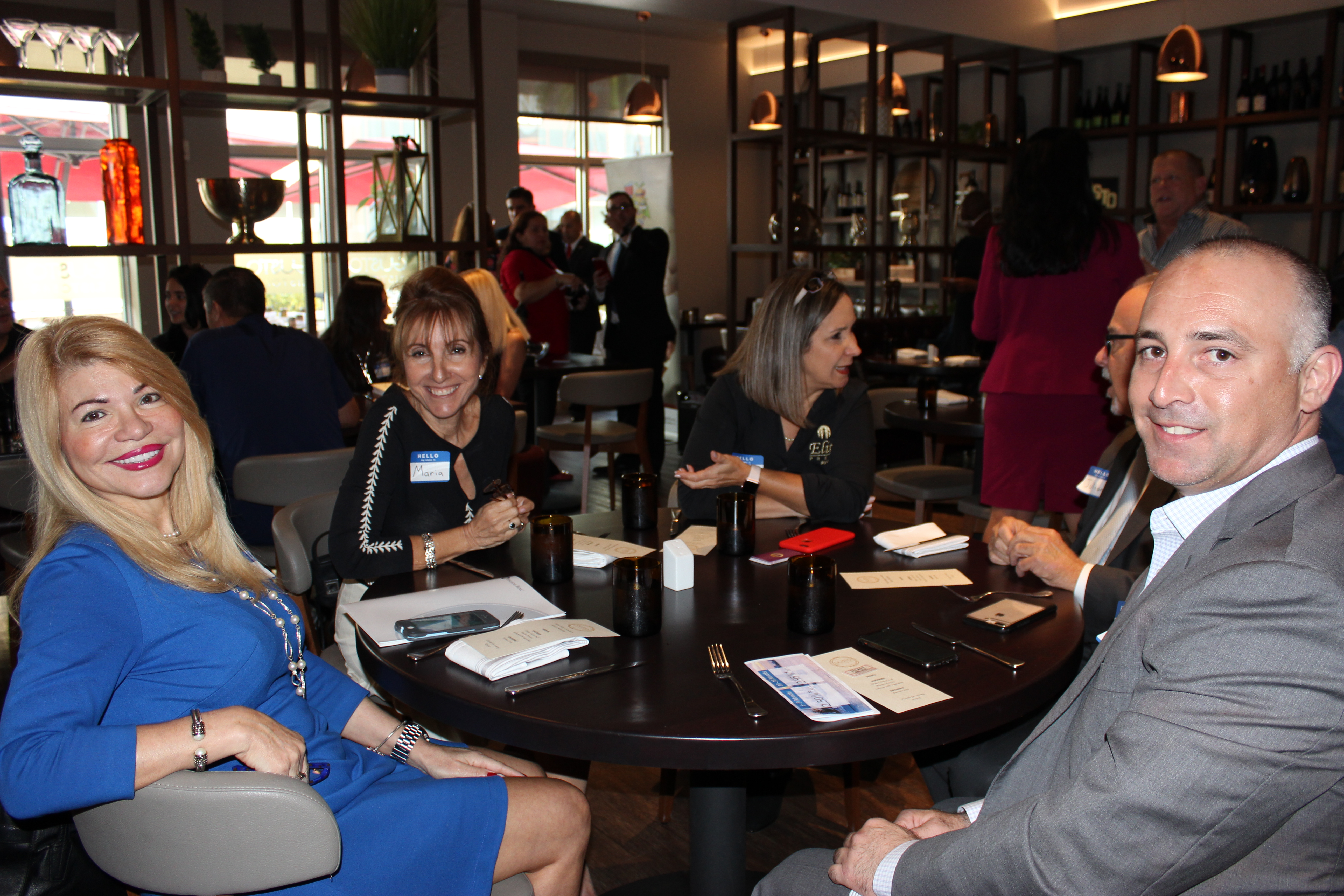 Doral Chamber of Commerce introduces a full table of guests in Gusto Ristobar luncheon.