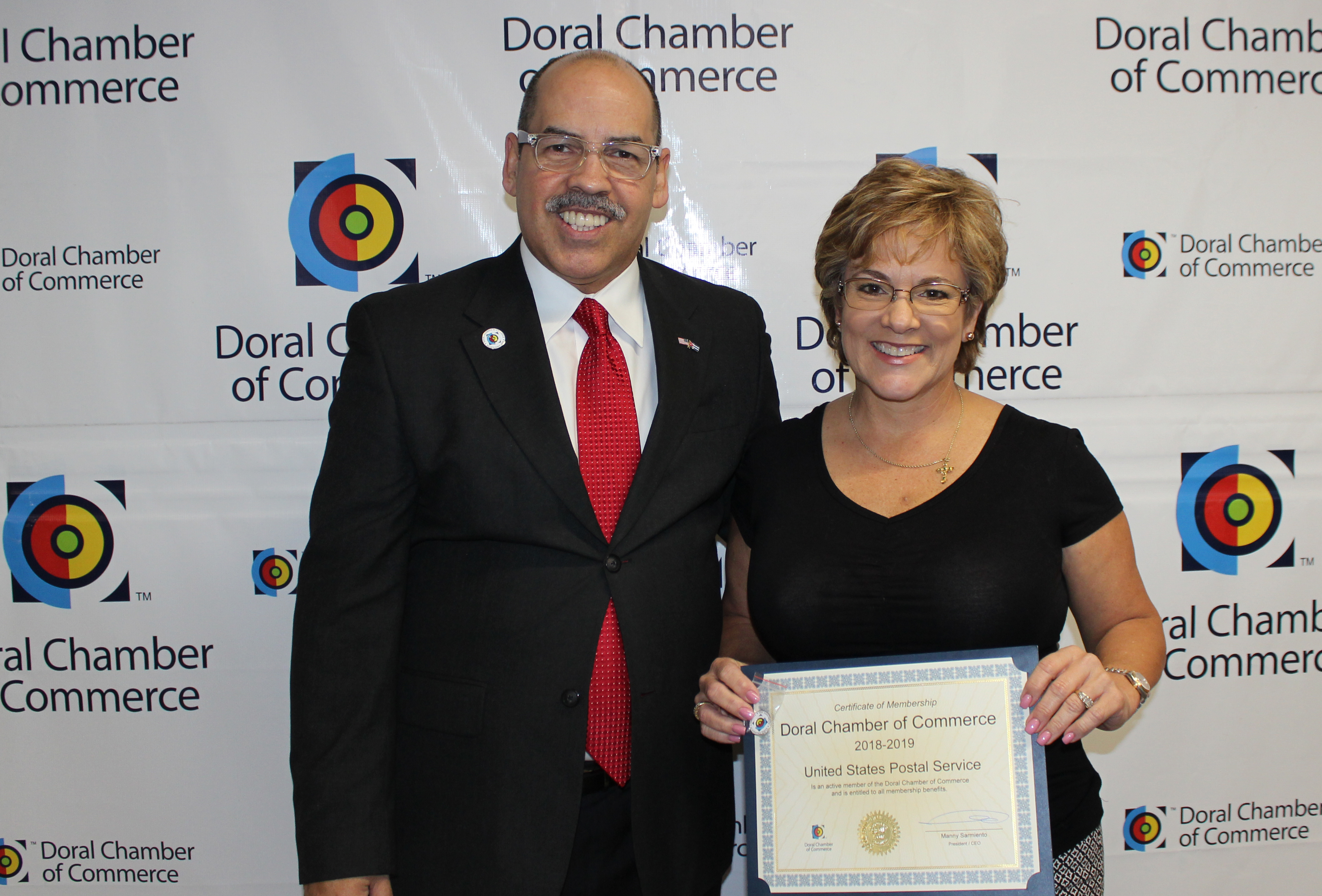 Doral Chamber of Commerce introduces Circle of Success event, photo with Manny Sarmiento, member being given an award.