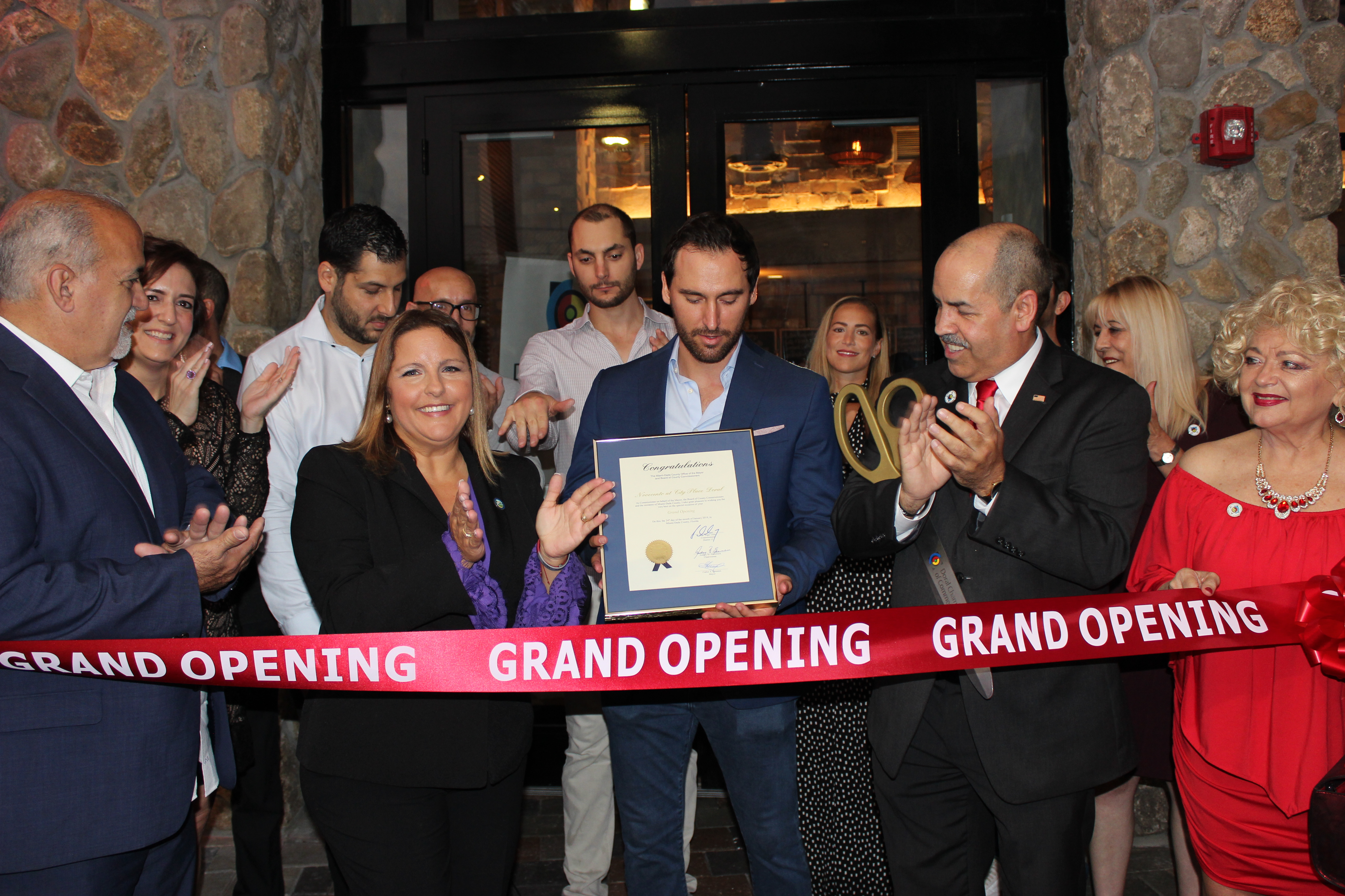 Doral Chamber of Commerce introduces Novecento Grand Opening, ribbon cutting with the owner.