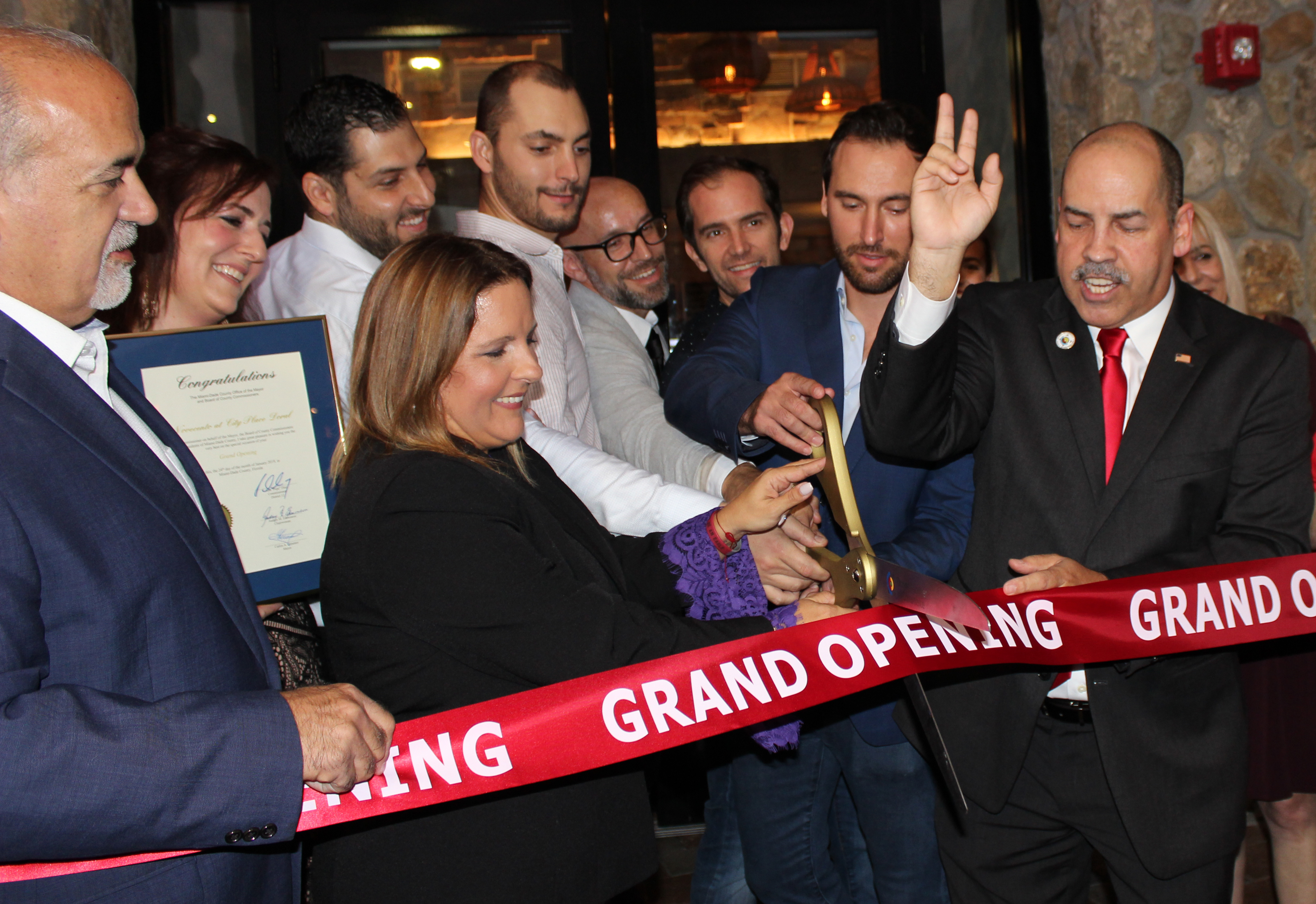 Doral Chamber of Commerce introduces Novecento Grand Opening, ribbon about to be cut for Grand Opening.