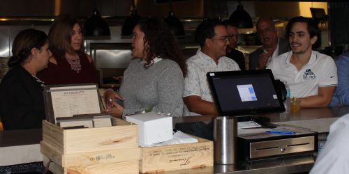 Doral Chamber of Commerce introduces Novecento Grand Opening, people waiting for their order.