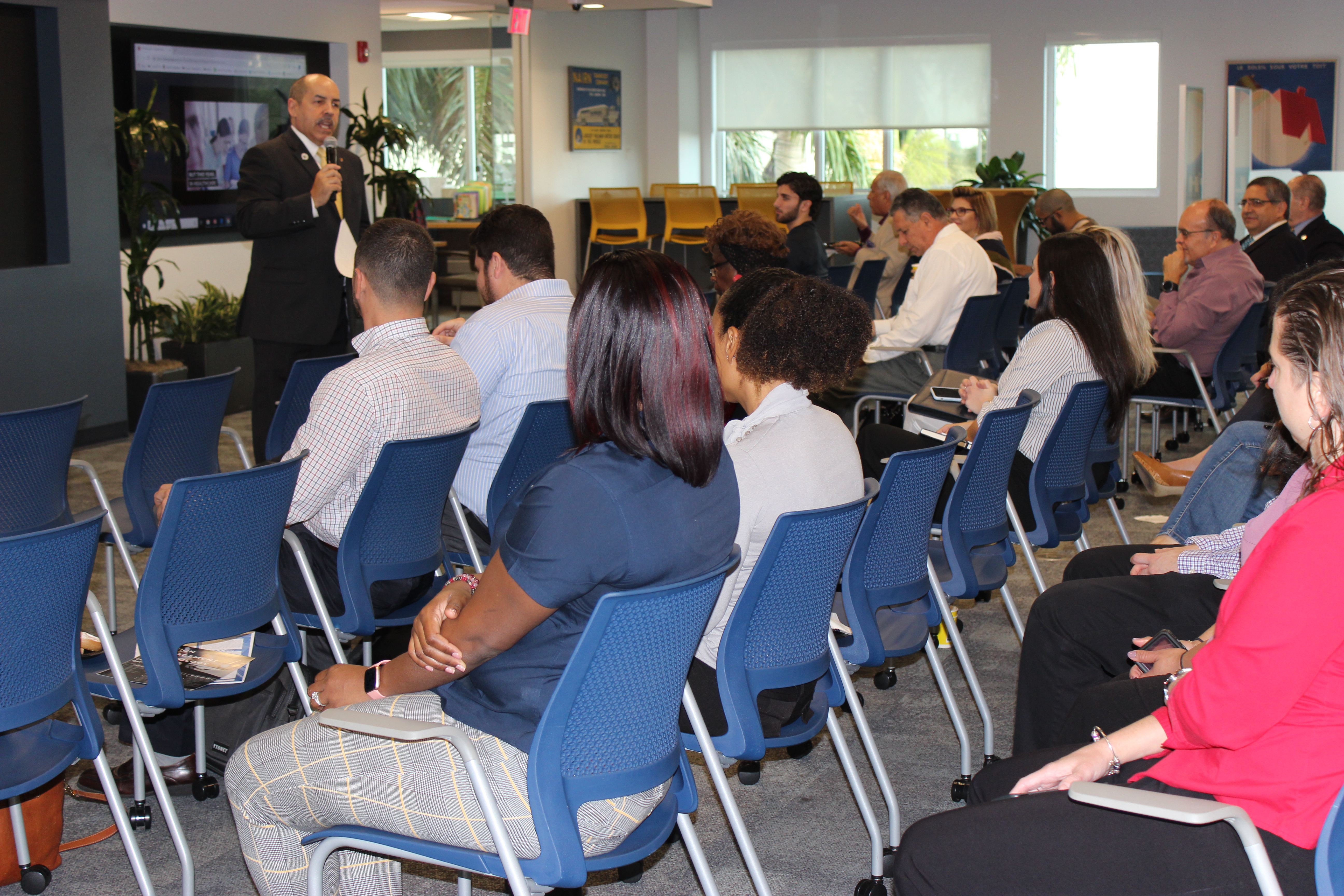 Doral Chamber of Commerce introduces DCC 21st Century Technology event, members learning about the latest technology from Manny Sarmiento.