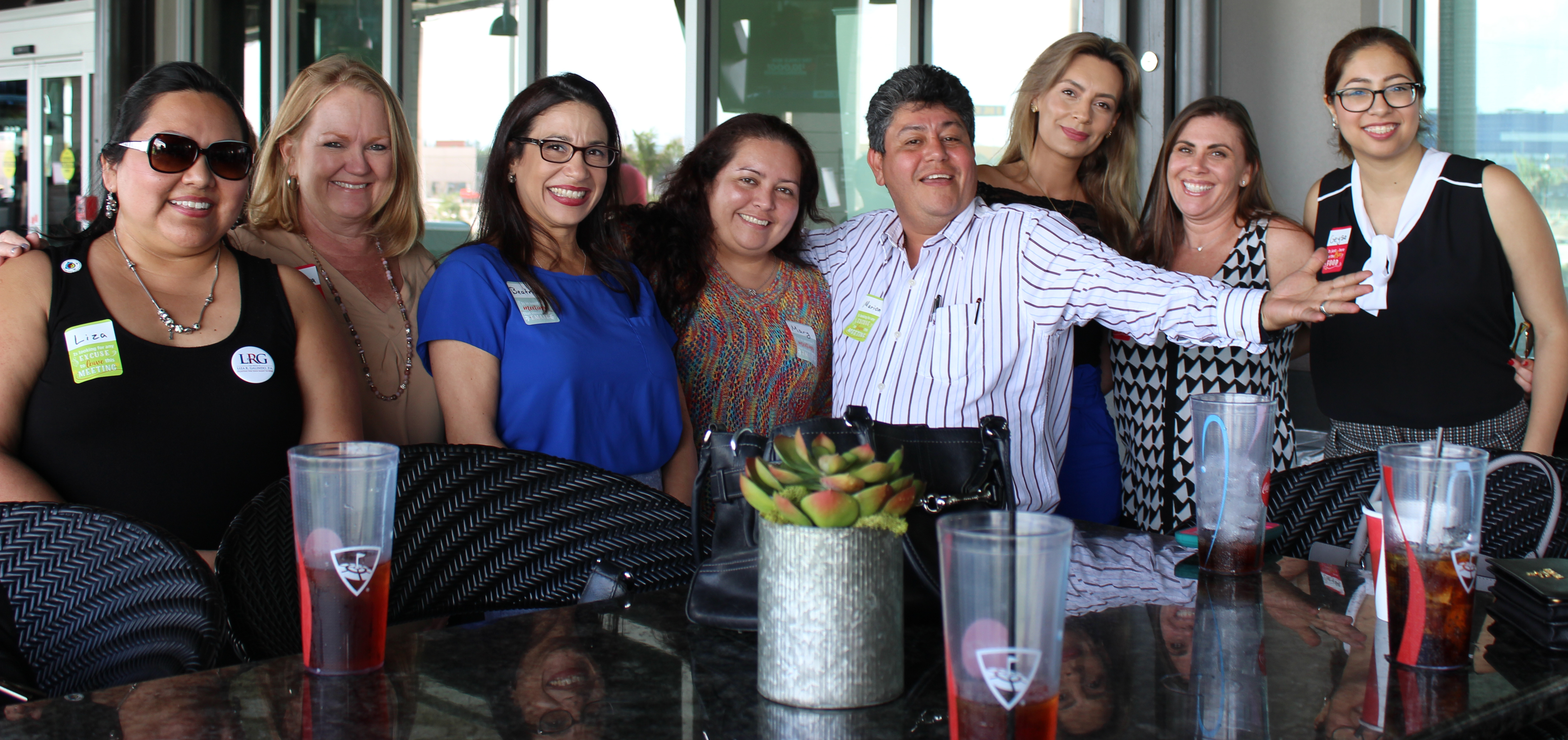 Doral Chamber of Commerce introduces a group photo of many members at Topgolf Doral Networking Luncheon Event.