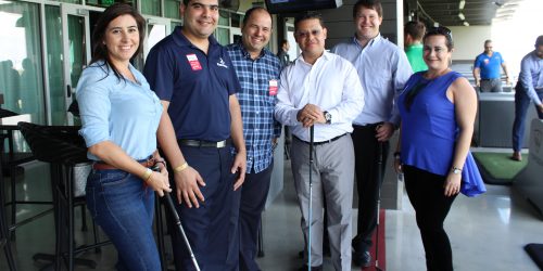Doral Chamber of Commerce introduces a group photo of golfers and members at Topgolf Doral Networking Luncheon Event.