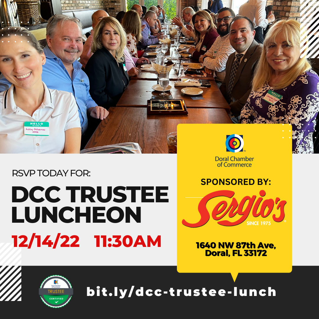 Doral Chamber Trustee Lunch at Sergios. Profesisonals smiling at the camera at professional event.