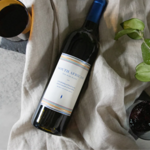 Cooper's Hawk Winery & Restaurant SOUTH AFRICAN RED BLEND Transport your palate with this South African Red Wine Blend! Our South African Red Blend is powerful and rich. The wine boasts flavors of blackberry and plum matched with savory herbal notes of bay leaf and peppercorn. The long rich finish of clove and nutmeg come from gentle barrel aging. Enjoy this wine with earthy mushroom dishes or roasted meats. The wine label reflects the rich heritage of textiles from the country.